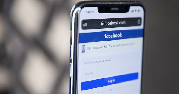 phone screen showing Facebook log in page