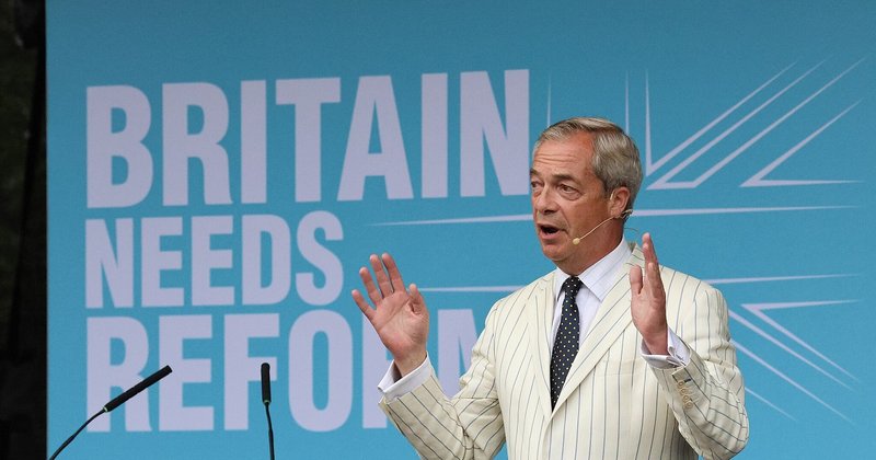 Nigel Farage speaking at a Reform UK event.