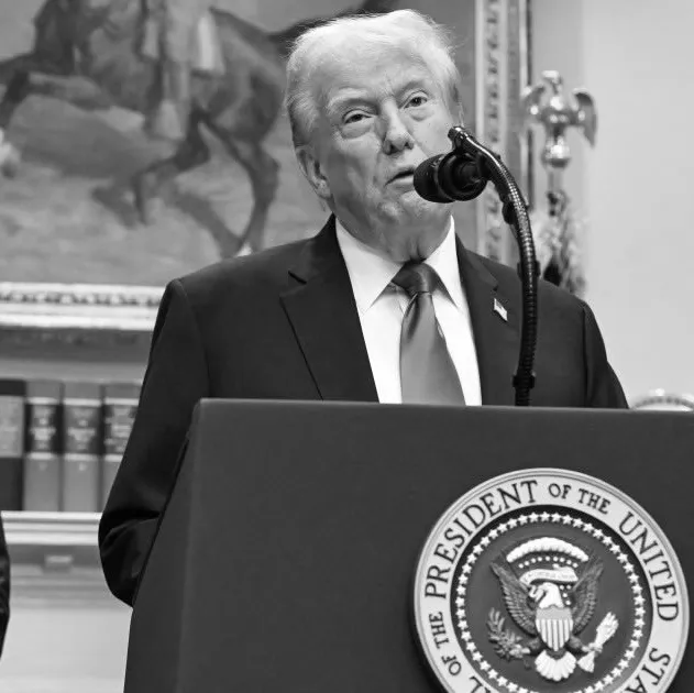 US President Donald Trump (C), alongside Secretary of Health and Human Services Robert F. Kennedy Jr. (L) and Medicare and Medicaid Administrator Mehmet Oz (R), speaks about autism in White House