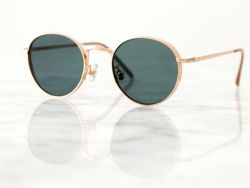 A pair of round-rimmed sunglasses