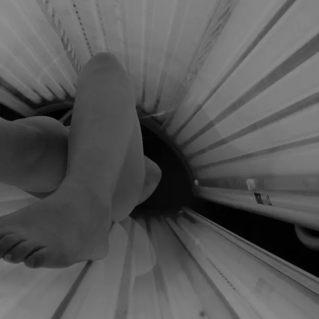 A tanning bed in use