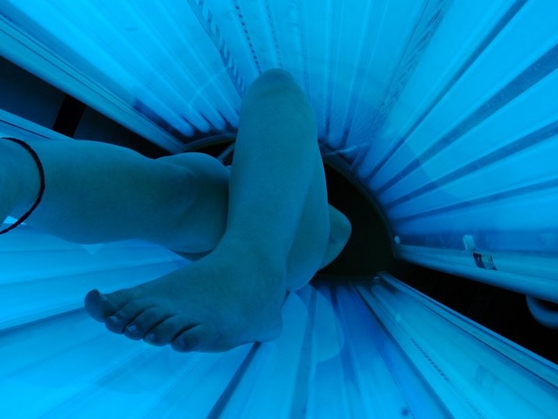 A tanning bed in use