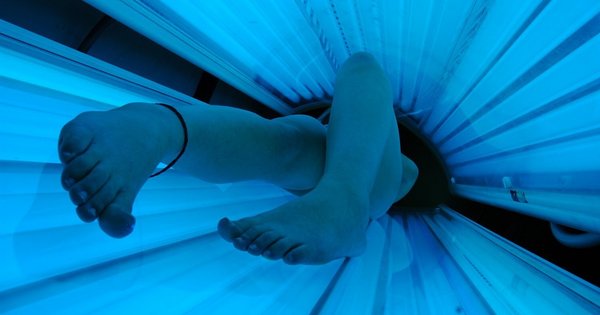 A tanning bed in use