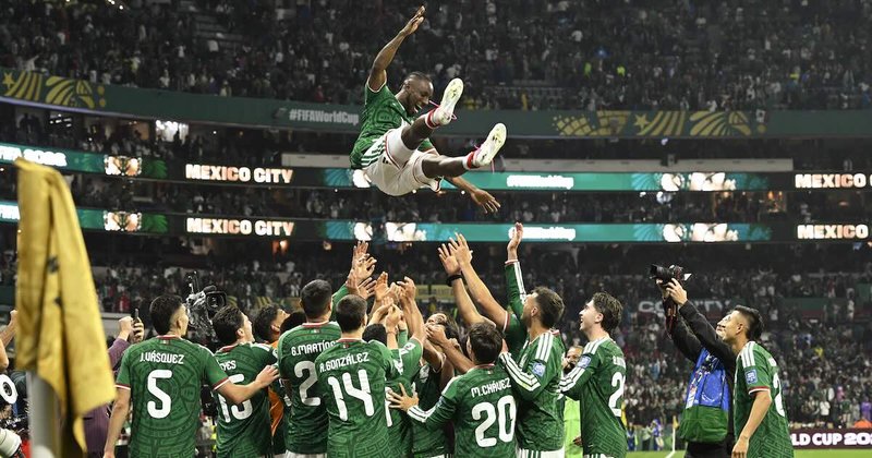 Mexico's players celebrate after winning the 2026 World Cup round of 32 football match between Mexico and Ecuador in Mexico City on 30 June.