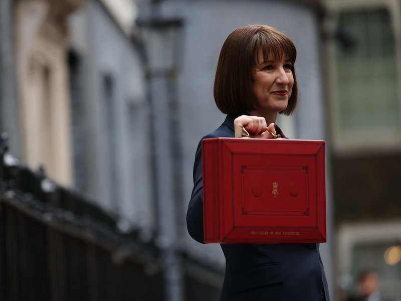 Rachel Reeves holding the red briefcase before the 2024 Autumn Budget