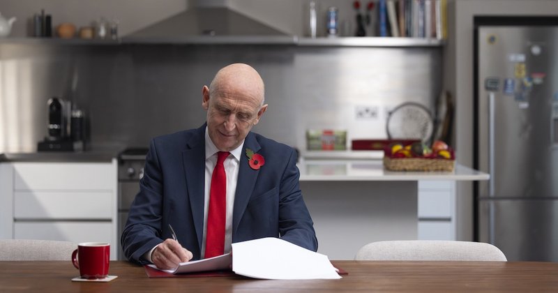 Chancellor John Healey preparing for the 2026 Budget sitting at a kitchen table in Downing Street.