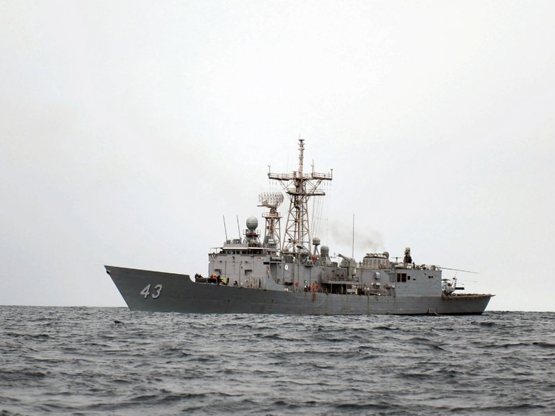 A picture of the USS Thach patrolling in international waters in, 2013