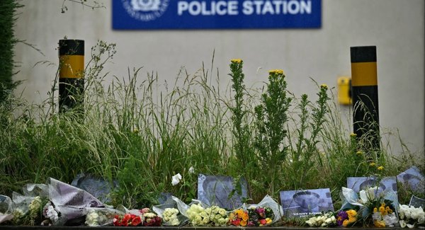 Floral tributes for Henry Nowak are pictured outside of Portswood Police Station in Southampton on 3 June