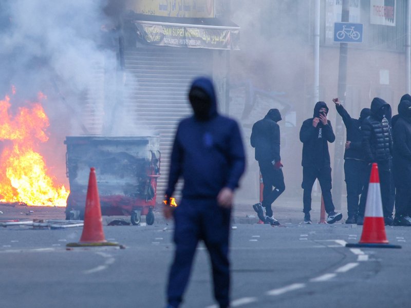 A building is set alight in the Sandy Row area of Belfast city centre, Northern Ireland, in the evening of June 9, 2026