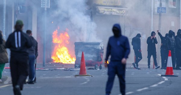 A building is set alight in the Sandy Row area of Belfast city centre, Northern Ireland, in the evening of June 9, 2026