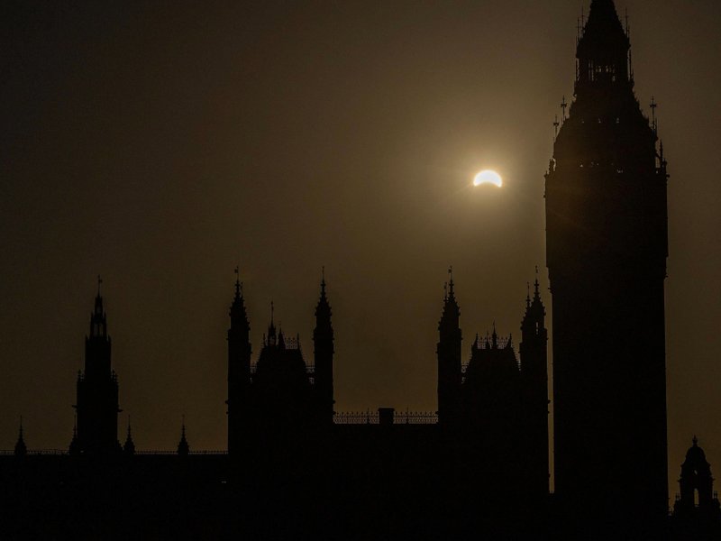 A partial solar eclipse, with more than 90 percent of the Sun blocked by the Moon across Britain, seen behind Big Ben.
