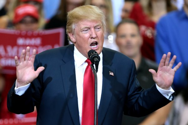 Donald Trump speaking with supporters at a campaign rally in Arizona.