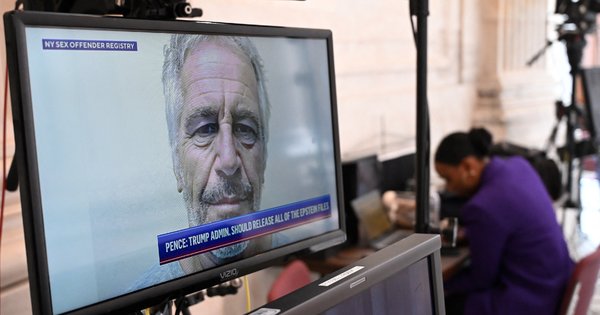 A mugshot of Jeffrey Epstein seen on a television in Washington DC in July 2025.