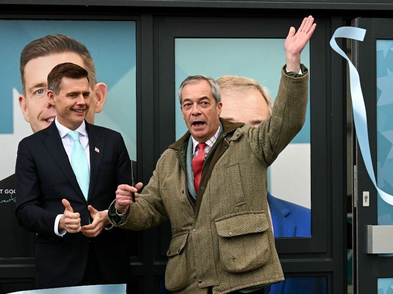 Matt Goodwin and Nigel Farage MP outside Reform UK’s campaign headquarters in Gorton and Denton.