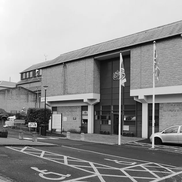 A sign outside a building reading “Welcome to HM Prison Durham”