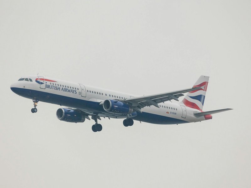 A photo of a plane in flight.