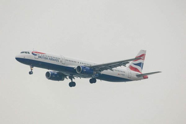 A photo of a plane in flight.