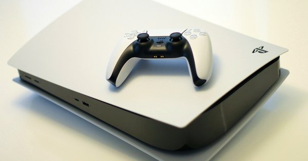 An image of a PlayStation 5 console and a controller.