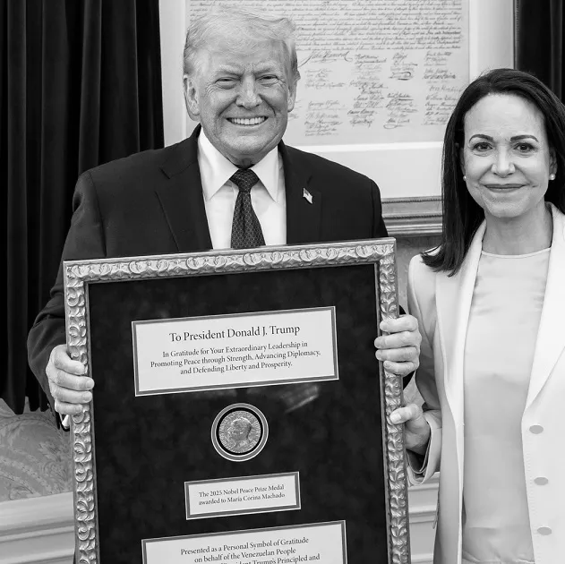 US President Donald Trump being presented with the Nobel Peace Prize awarded to Venezuelan opposition leader Maria Corina Machado.