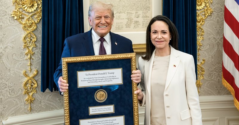 US President Donald Trump being presented with the Nobel Peace Prize awarded to Venezuelan opposition leader Maria Corina Machado.
