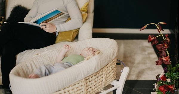 A baby in a wicker basket