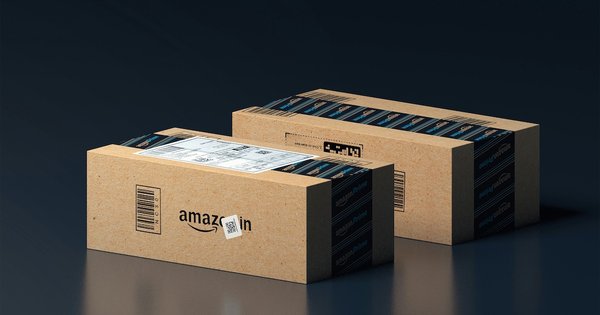 Two boxes with the Amazon logo on their sides