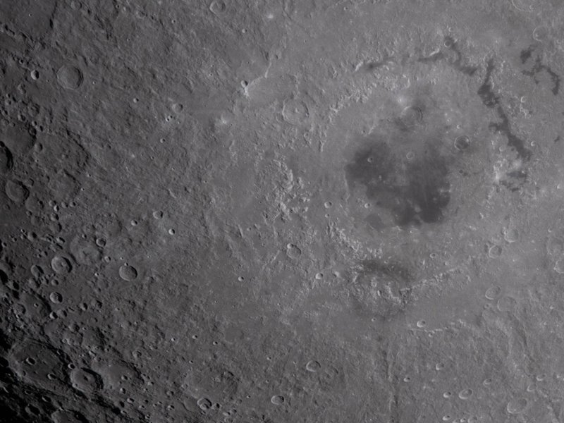The Orientale Basin seen on the lower half of the moon.