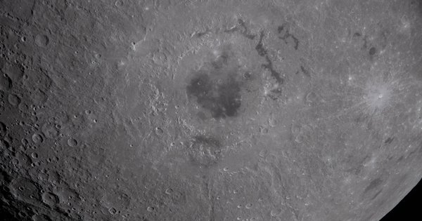 The Orientale Basin seen on the lower half of the moon.