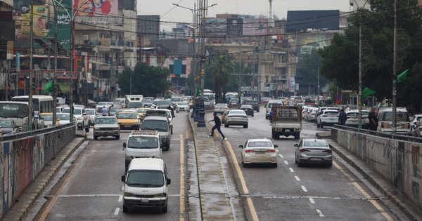 Vehicles driving on a road in Baghdad, Iraq