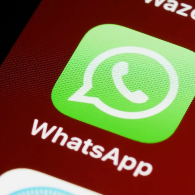 A photo of a phone screen showing the Whatsapp app icon
