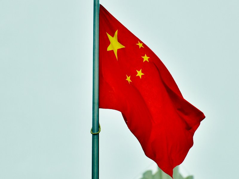 The national flag of the People's Republic of China on a flagpole