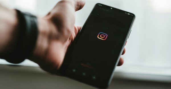 A phone screen displaying the Instagram logo