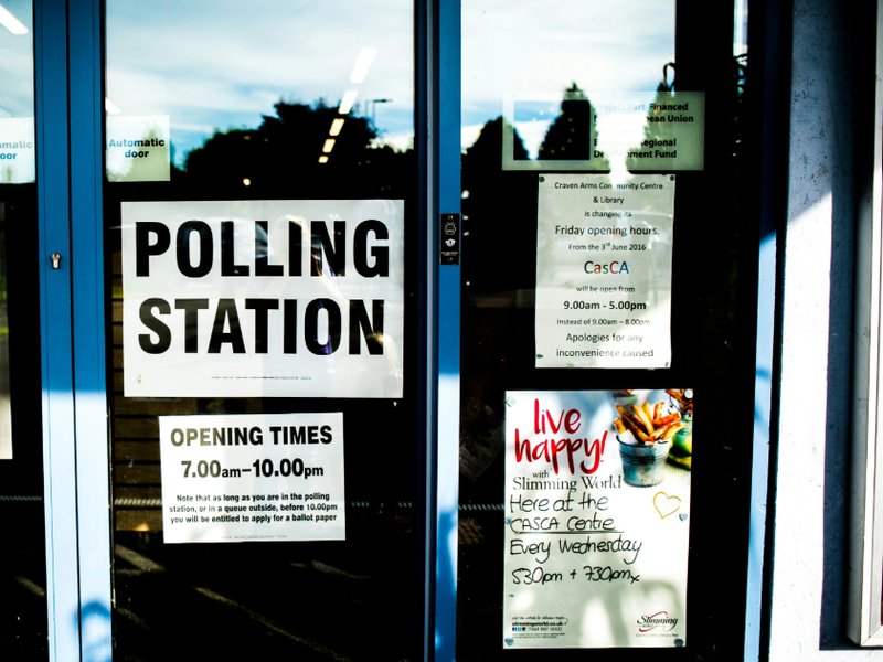 Door with the words “Polling Station” on it.