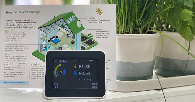 A smart meter displaying electricity and gas costs