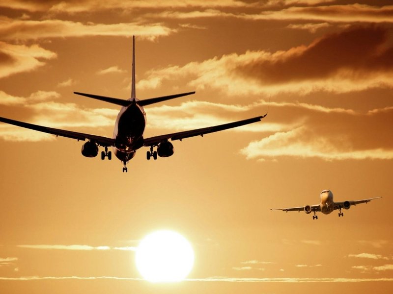 Silhouette of airborne aeroplanes.