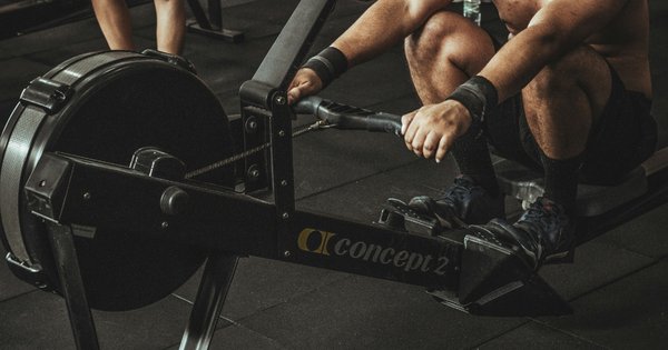 An image of a man using a gym machine.