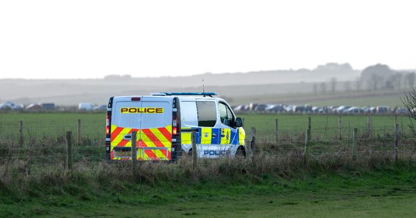 Police van on rural road