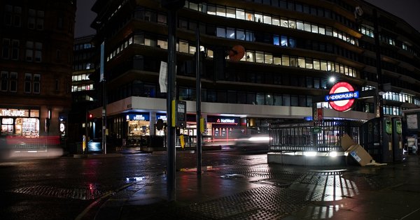 A picture of an empty street at night in London