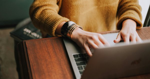 A person using a laptop.