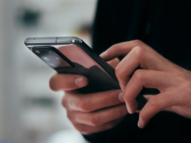 A man holding a mobile phone