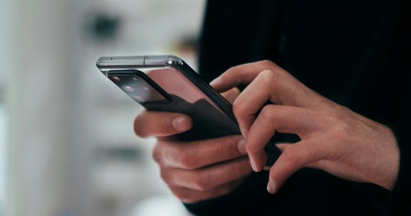A man holding a mobile phone
