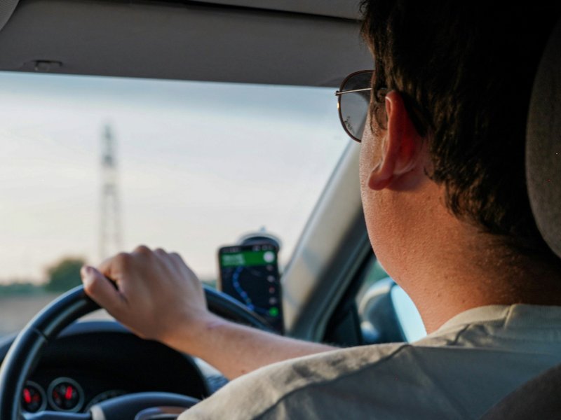 A man driving a car