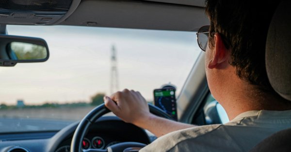 A man driving a car