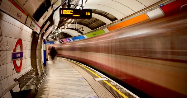 A picture of a Tube train travelling through Bank London Underground station.