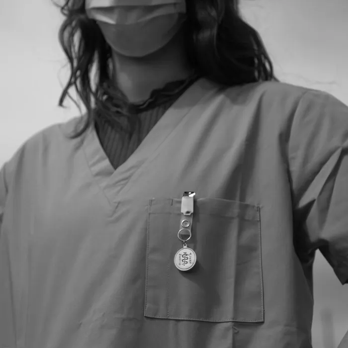 A nurse wearing a mask