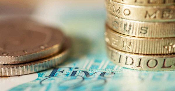 money-in-a-pile-and-blue-five-pound.jpg