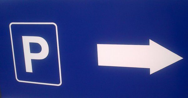 A pay and display parking sign.