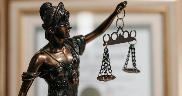 Themis figurine at lawyers office