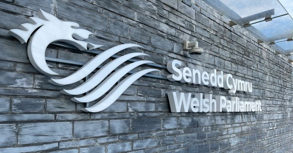 A sign for the Senedd, the Welsh Parliament.