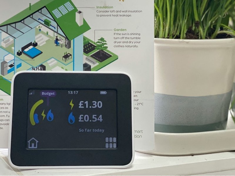 A smart energy meter sat on a windowsill